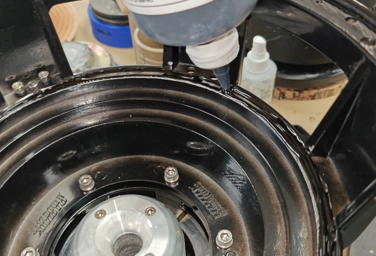 Sundown Audio recone angle grinder used for subwoofer spider landing preparation, removing old glue and cleaning basket surfaces for accurate speaker recone repairs.